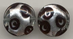 Silver Discs with Black Eyes